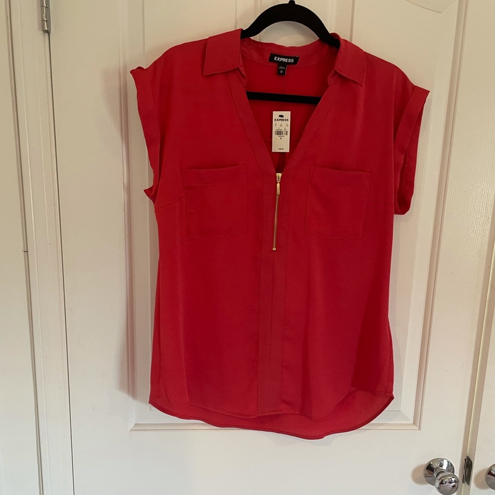 Red top with pockets in the front - never used